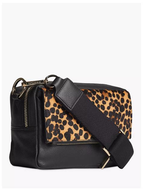 leopard print cross body bag.